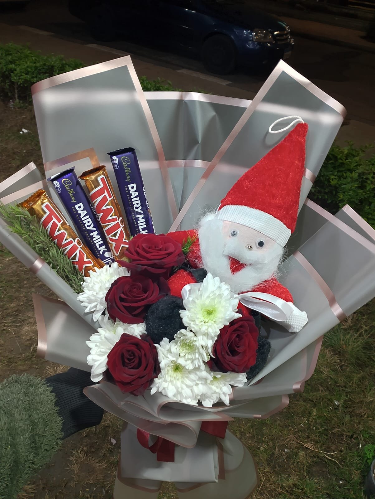 Mini Christmas Gift Box – Red Roses, White Cherry Stems, Santa Plush & Chocolates Mini Christmas Gift Box – Red Roses, White Cherry Stems, Santa Plush & Chocolates - Image 2