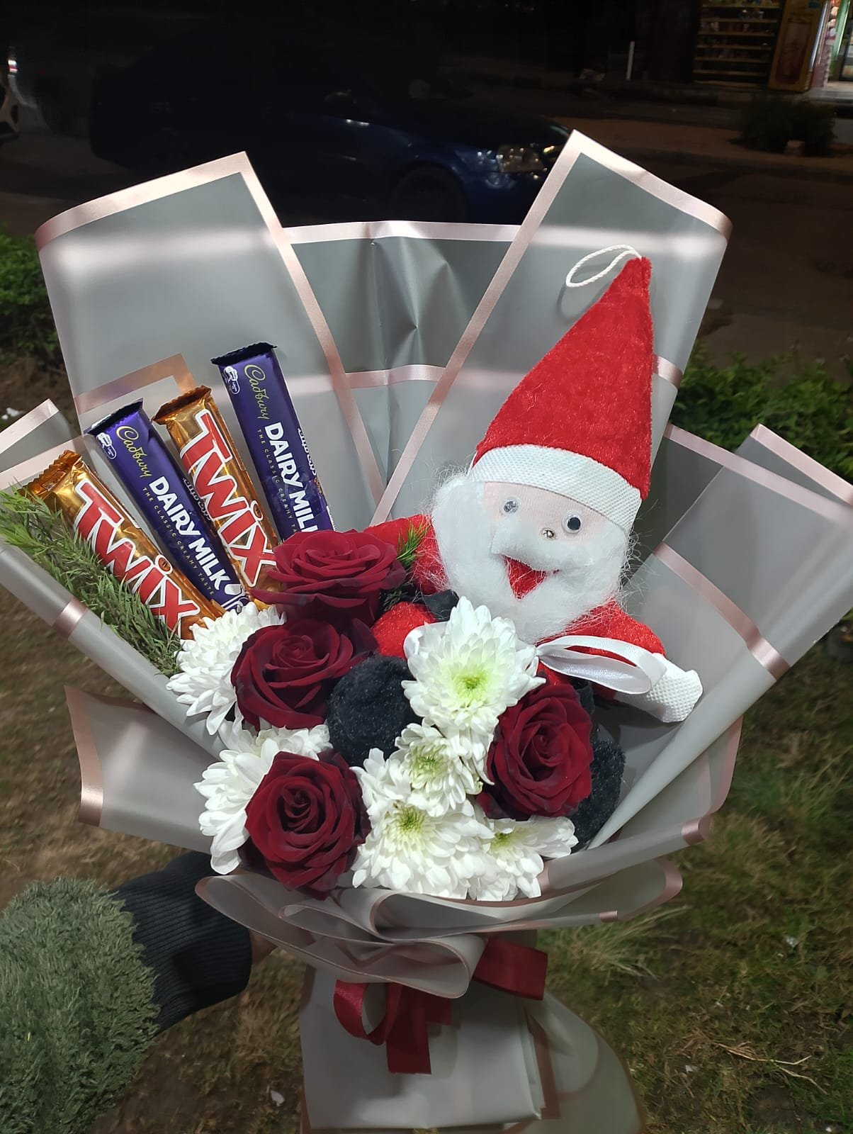 Mini Christmas Gift Box – Red Roses, White Cherry Stems, Santa Plush & Chocolates Mini Christmas Gift Box – Red Roses, White Cherry Stems, Santa Plush & Chocolates